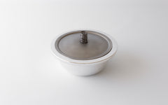 Risotto Pfanne aus reinem Silber mit Deckel aus Titanium.